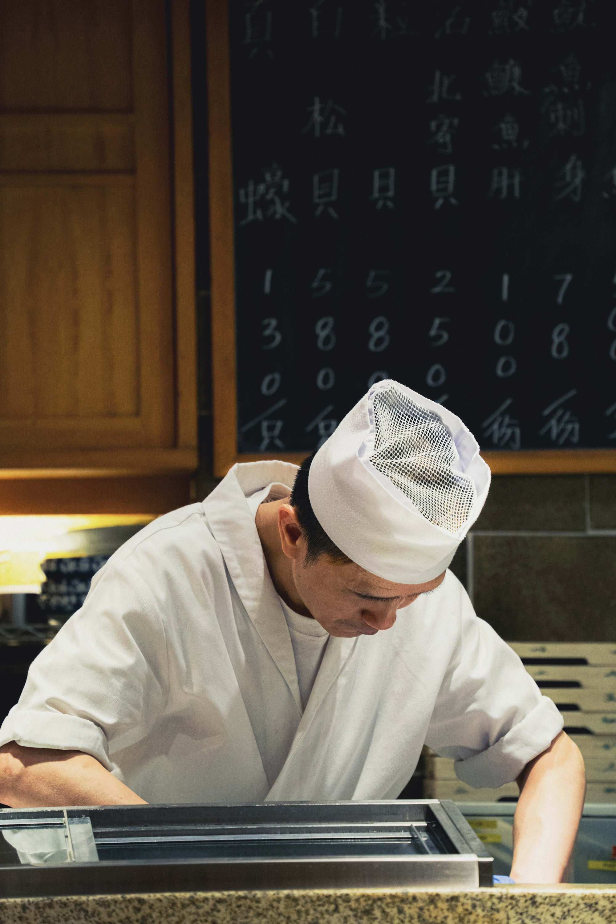 A chef at work at the counter